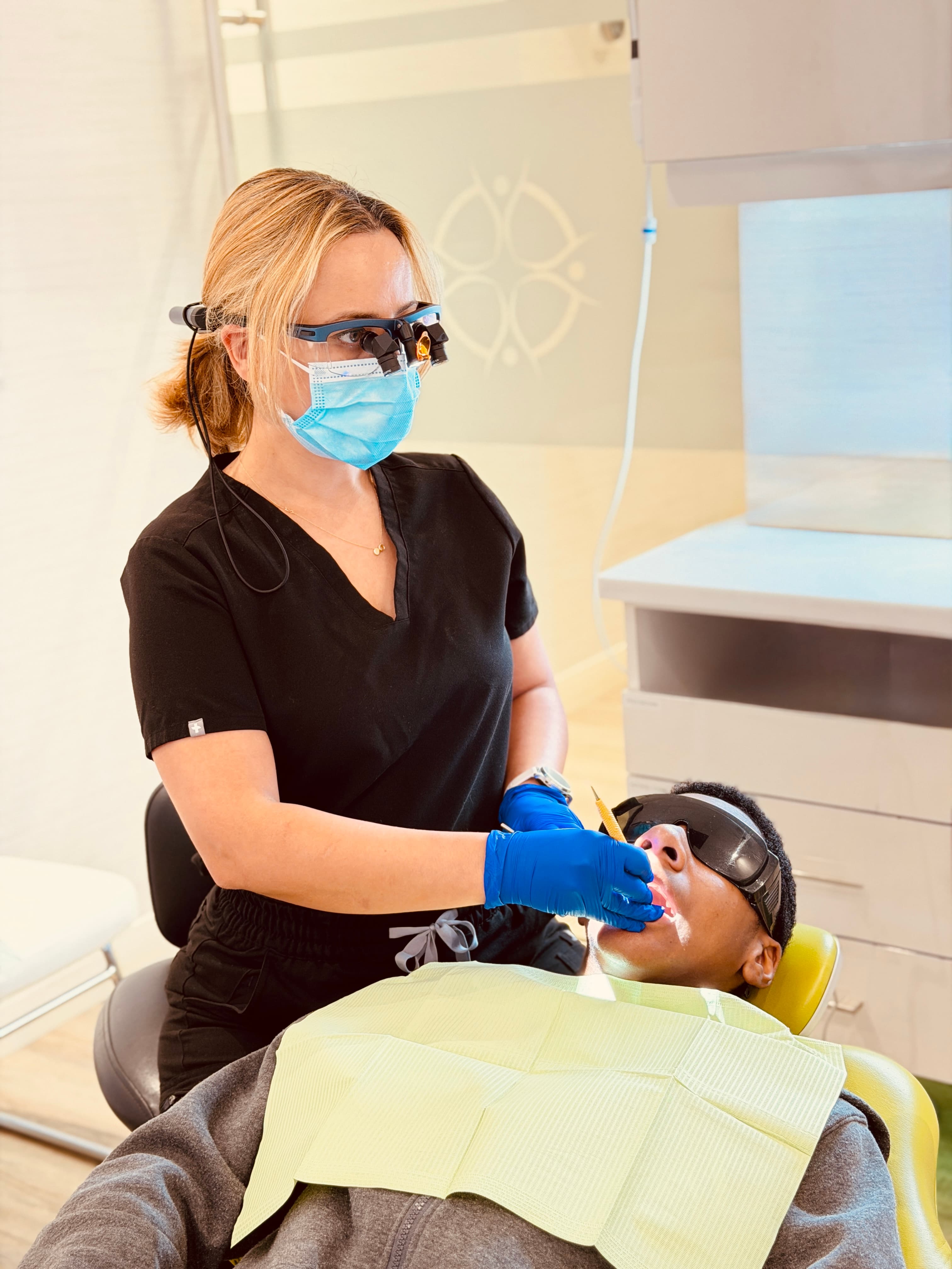 Dentist preparing for dental cleaning