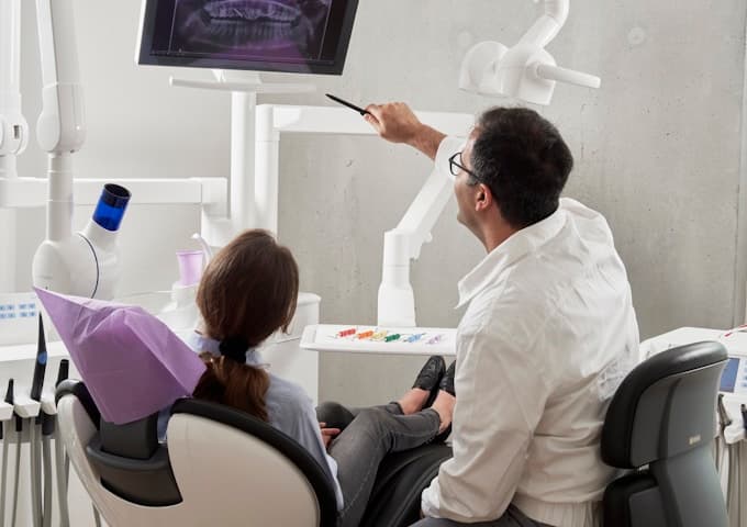Clinical dental consultation reviewing cosmetic treatment options