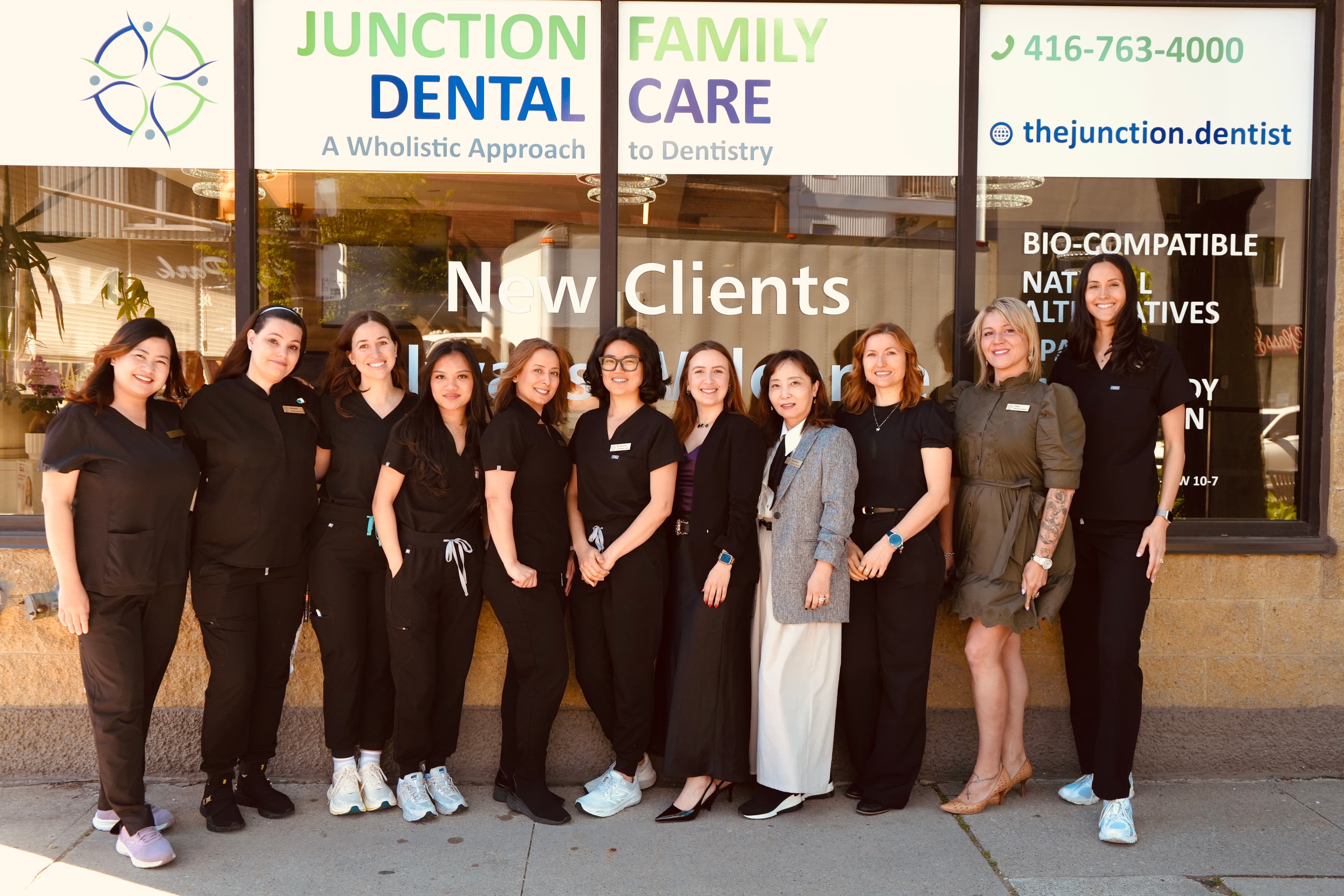 The Junction Family Dental Care team outside the clinic